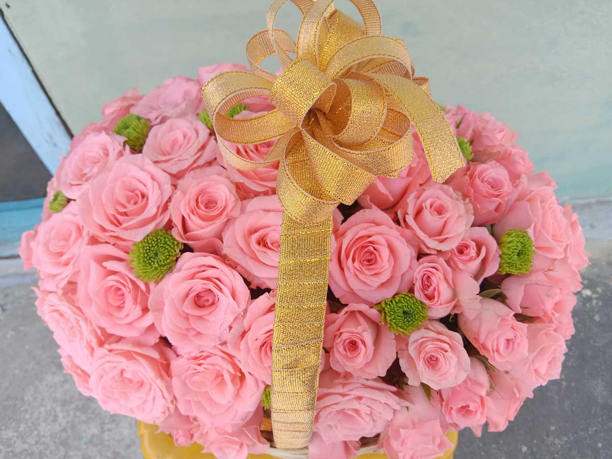 Elegant Pink Roses Basket with Golden Bow