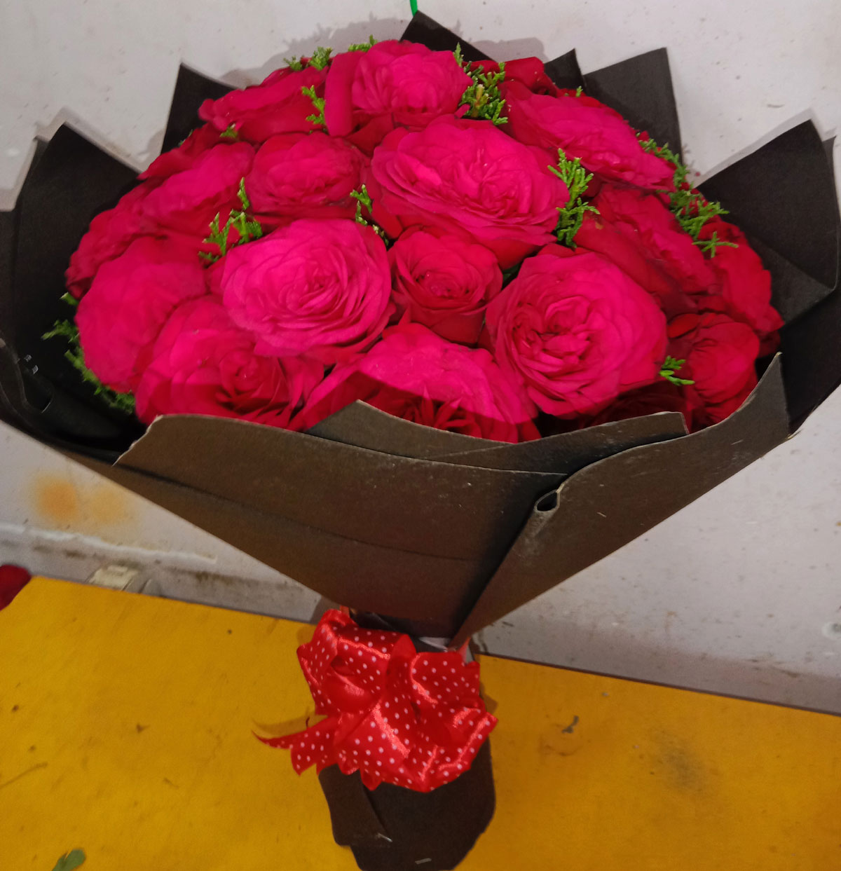 Lovely Red Roses with the Black colour Tissue paper packing Bouquet