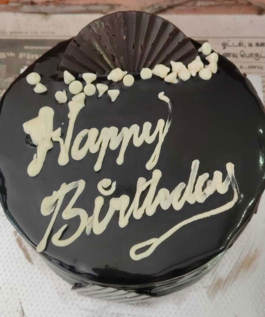 Rich Chocolate Glaze Birthday Cake with White Chocolate Decoration